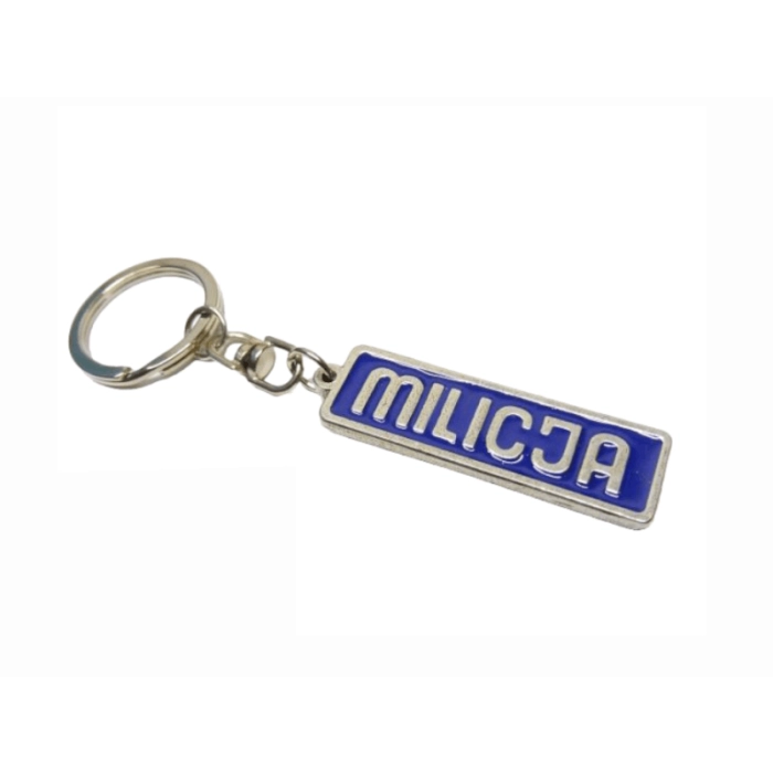 Breloczek metalowy z napisem MILICJA